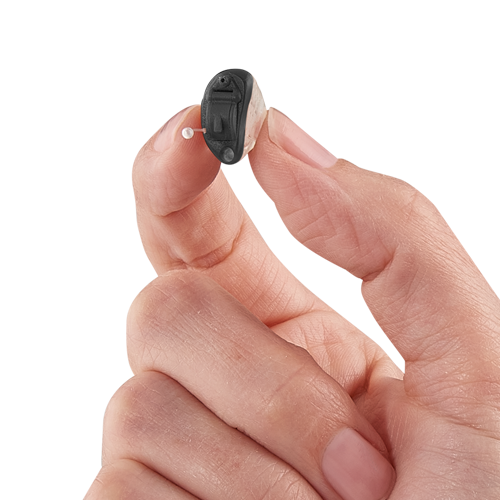 Completely-In-Canal Hearing Aid in hand
